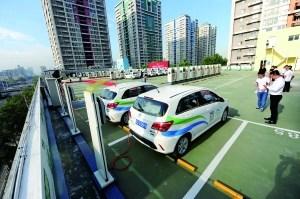 A new electric vehicle charging station was officially opened for use on the sixth floor of a parking garage at SOHO Modern City in Chaoyang District, Beijing，August 8, 2017. (Photo/Beijing Morning Post)