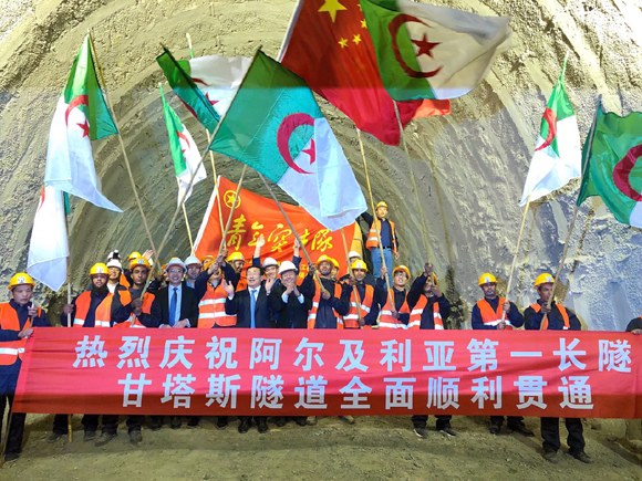 Constructors celebrate cutting through the Gantas railway tunnel in Algeria, Oct. 30, 2017. (Photo courtesy of China Railway Construction Corporation)
