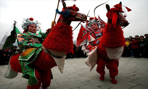 Ancient Longmen town stages a folk art fair for this Spring Festival. Photo: CFP