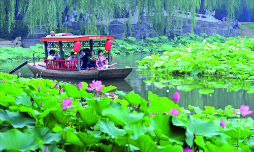 Head to one of Beijing's lakes and enjoy the lotus flowers.