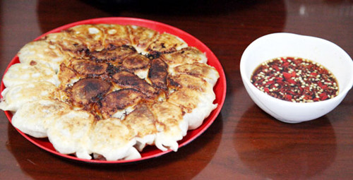 Homemade dumplings [Photo by Fan Zhen/China Daily]