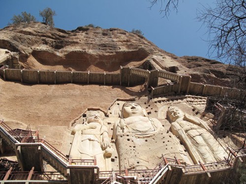 Three Buddha statues carved on the cliff surface are the highlights of Maiji's Buddhist heritage. Li Yang / China Daily