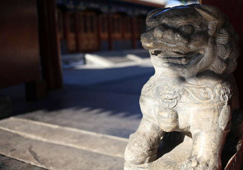 A stone lion at the gate of Prince Gong's Mansion.