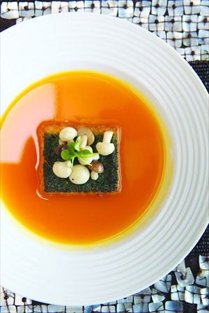 Sick of mystery meats, Beijingers are pushing for more vegetarian options. Samadhi, an all-vegetarian spot, serves this green tofu in golden soup dish. Photo: Courtesy of Samadhi