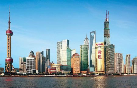 The golden AURORA building, located on the bank of the Huangpu River, is considered a landmark of Shanghai. Provided to China Daily