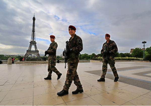 Policemen on patrol in Paris. Photo by Liu Jiwen / Provided to chinadaily.com.cn