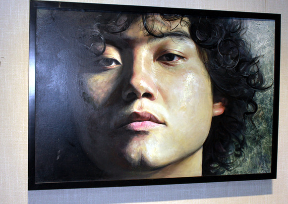 A self portrait by Li Muzi is exhibited at Shangba International Art Exhibition Center in Beijing from September 7 to 20, 2014. [China.org.cn]  