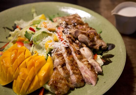 Chicken salad with mango and shredded coconut stuffing.[Photos by Feng Yongbin / China Daily]  