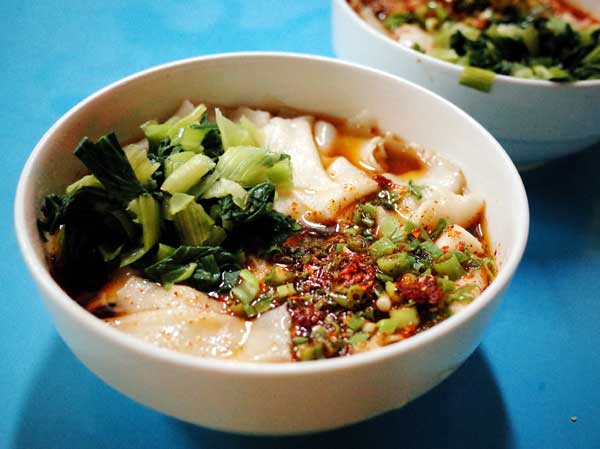 Youpojiumian [Photo by Fan Zhen/chinadaily.com.cn]  