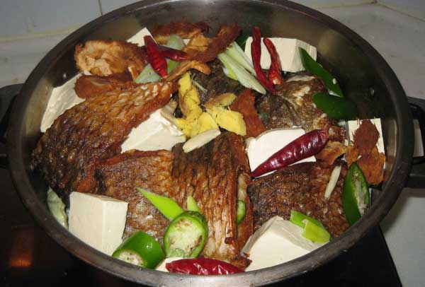 Stewed carp with bean curd [Photo provided to China Daily]