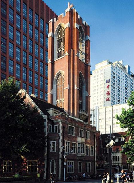 A recent photo of the Moore Memorial Church designed by Hudec in 1929. It has been a landmark at the Peoples Square. After a restoration to repair the golden windows and cracks on the façade harmed by neighboring highrises, the church reopened to the public in the spring of 2010.  Zhang Xuefei/Shanghai Daily