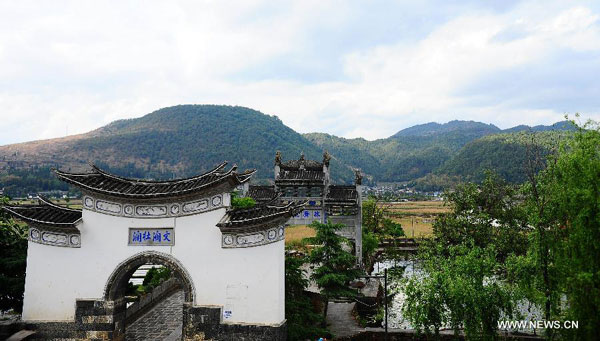 Photo taken on Apr 16, 2013 shows the scenery of the ancient townlet Heshun in Tengchong county, Southwest China's Yunnan province. Tengchong is among the 30 most beautiful counties in China for the year 2014 released by China Institute of City Competitiveness. [Photo/Xinhua]  
