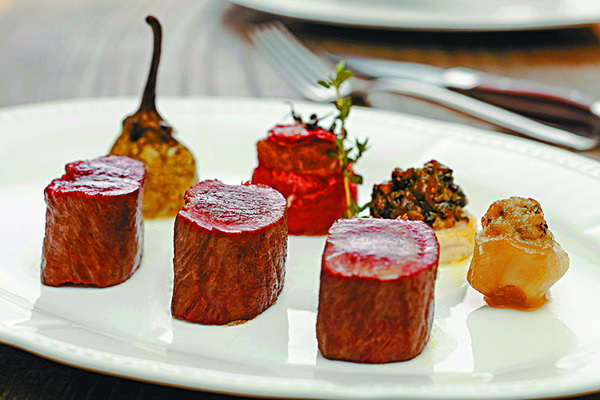 Braised lamb fillet with vegetables.  