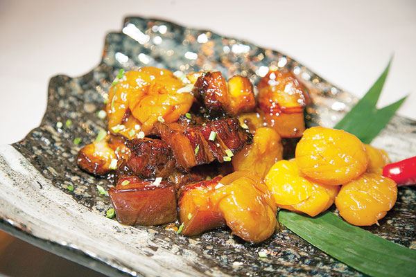 Fusion: Candied plums offer the notoriously greasy Shanghai pork a fresh and sour balance. [Photo provided to Shanghai Star]  