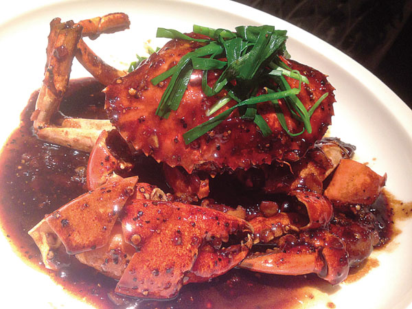 Pepper crab: A credible version of Singapores national dish. [Photo provided to Shanghai Star]  