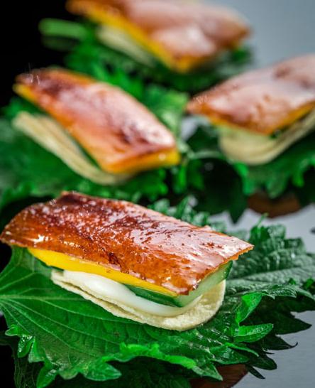 Salad mango with duck is a cold dish with strips of succulent roast fowl with crispy skin, layered with fresh cucumber, slices of mango from Thailand and slightly sweet cream. [Photo provided to China Daily]  