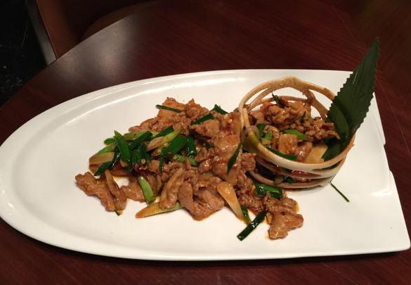 Stir-fried pork with leeks. Photo/provided to China Daily)  