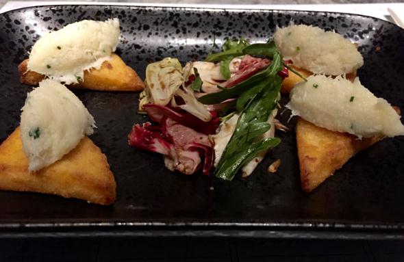 Salt cod with potato and salad makes an attractive plate. (Photo: Mike Peters/China Daily)  