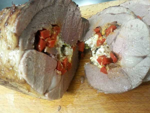 Stuffing the butterflied leg of lamb with layers of peppers and cheese is easy to do, and when the final dish is sliced, the spiraling design makes the meat and stuffing as beautiful as it is delicious. Photo provided to China Daily  