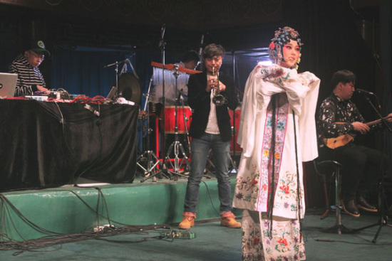 Performers of Chinese opera share the stage with musicians playing Western instruments such as the trumpet and drum in the show Chinese Music House, which is an experimental re-interpretation of the country's ancient performing art. (Photo/China Daily)
