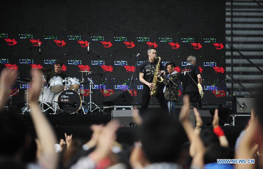 Members of La Souris Deglinguee, a French rock band, give performance at the Midi Festival Beijing 2012 in Shunyi Olympic Rowing-Canoeing Park, Beijing, capital of China, April 29, 2012. The three-day Midi Festival Beijing 2012 opened here on Sunday with the theme of environmental protection. (Xinhua/Xiao Xiao)