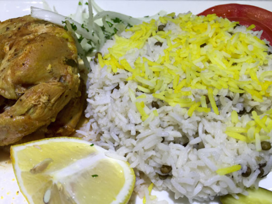 Iranian chefs at Persepolis restaurant in Beijing convert the precious red threads of saffron into golden rice.(Photo provided to China Daily)