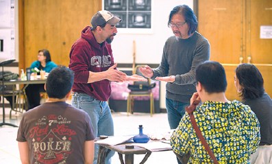 Stan Lai works with the cast at the rehearsal of Secret Love in Peach Blossom Land. Photo provided to China Daily  