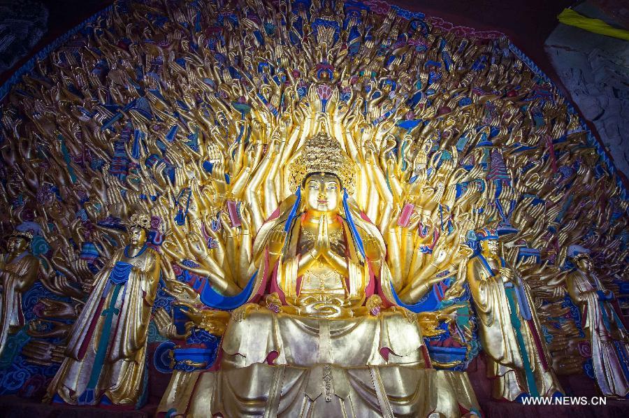 China restores 800-year-old Buddhist statue(1/4)