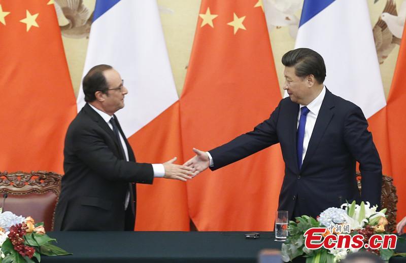 Chinese, French presidents reach deal on climate change(1/1)