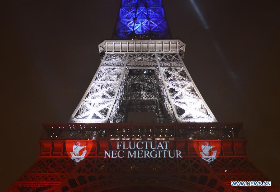 Eiffel Tower Glows in French Colors to Honor Victims
