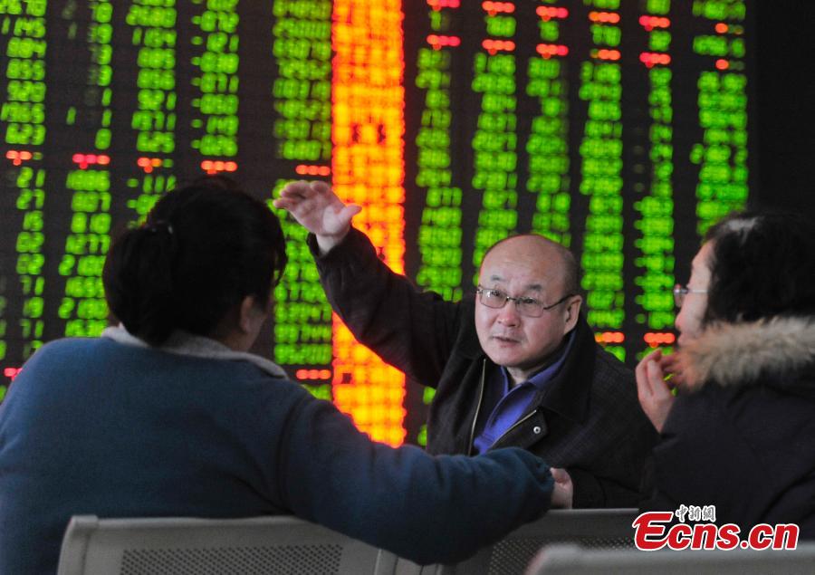 China halts trading after stocks plunge 7% (1/5)