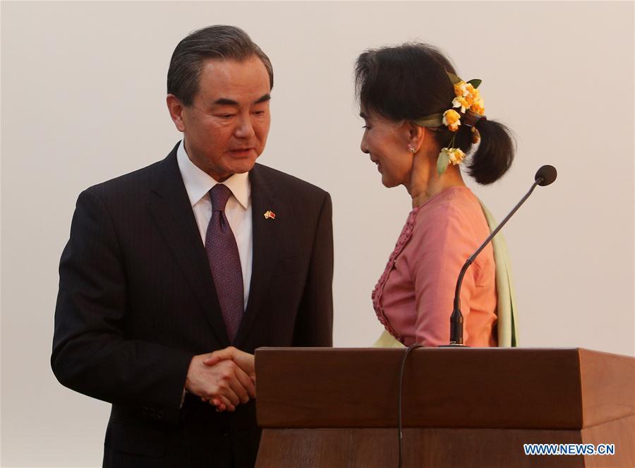 Wang Yi meets with Aung San Suu Kyi in Myan