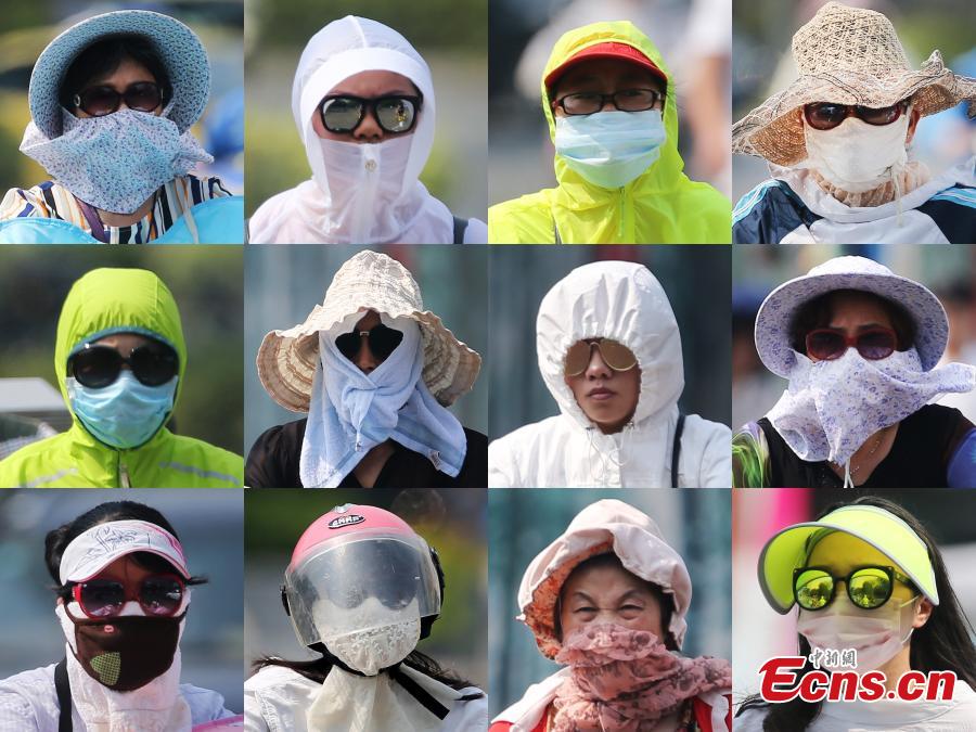 China issues orange alert for high temperatures(1/8)