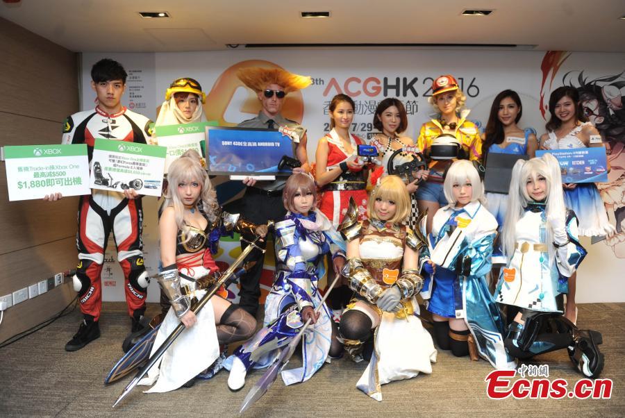 Cosplayers pose in the run up to the 18th Animation-Comic-Game Hong Kong (ACGHK) in Hong Kong. The fair to be held at the Hong Kong Convention and Exhibition Centre runs from July 29 to Aug 2, and it has attracted 80 exhibitors, including PlayStation, Xbox and Hot Toys, to its 600 booths. (Photo: China News Service/Tan Daming)