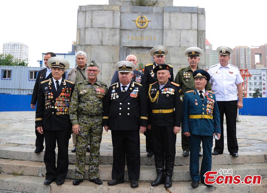 Russian veterans attend a memorial ceremony to mark the 71st anniversary of the Victory in the World Anti-Fascist War in front of a monument in Changchun City, Northeast China’s Jilin Province, Sept. 1, 2016. The Russian delegation of 40 veterans attended the ceremony to pay respect to former Soviet soldiers who died during the war of resistance against Japanese aggression in northeast China. The monument bears the names of 23 former Soviet soldiers written in Russian. (Photo: China News Service/Zhang Yao)
