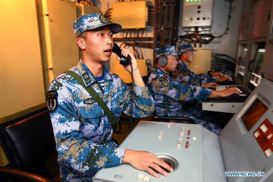 A radar operator reports situation on Chinese frigate \