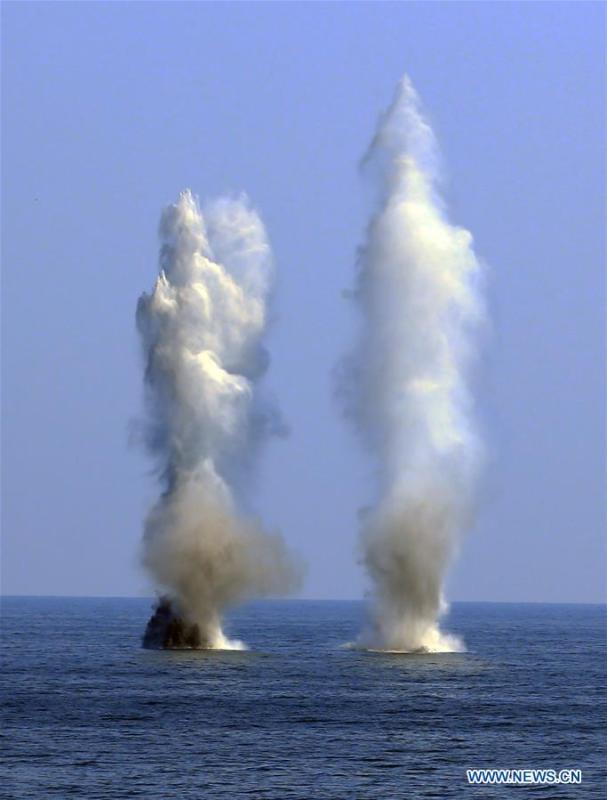 Water columns soar high after Chinese frigate \