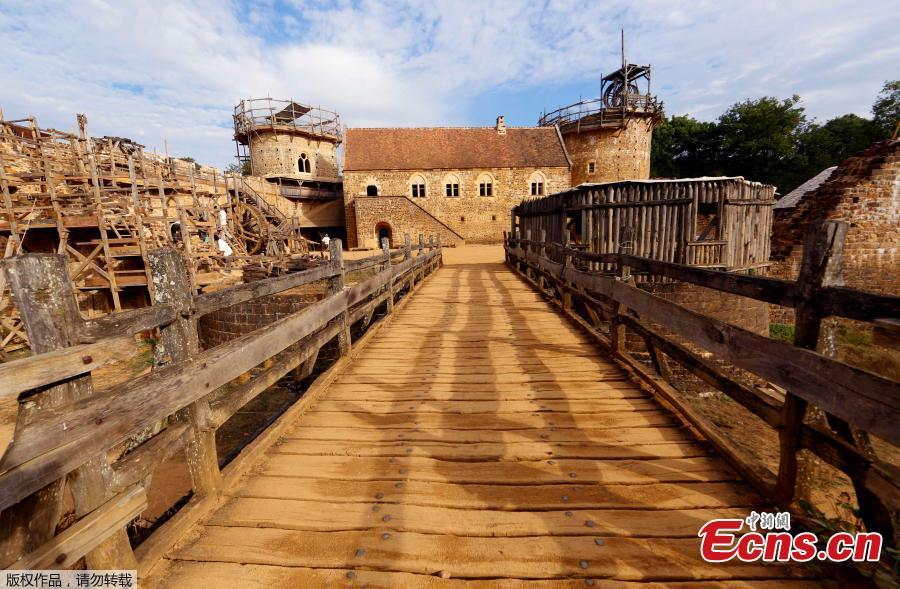 The Guédelon Castle under construction in Treigny, France, Sept. 13, 2016. Conceived by Michel Guyot, owner of Saint-Fargeau Castle, the project started in 1997 and the aim is to build an entire castle using nothing but tools, techniques, and materials that 13th century workers would use. The project has created jobs and is now a tourist destination, with more than 300,000 visits each year. (Photo/Agencies)