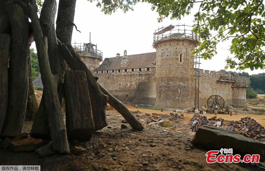 The Guédelon Castle under construction in Treigny, France, Sept. 13, 2016. Conceived by Michel Guyot, owner of Saint-Fargeau Castle, the project started in 1997 and the aim is to build an entire castle using nothing but tools, techniques, and materials that 13th century workers would use. The project has created jobs and is now a tourist destination, with more than 300,000 visits each year. (Photo/Agencies)