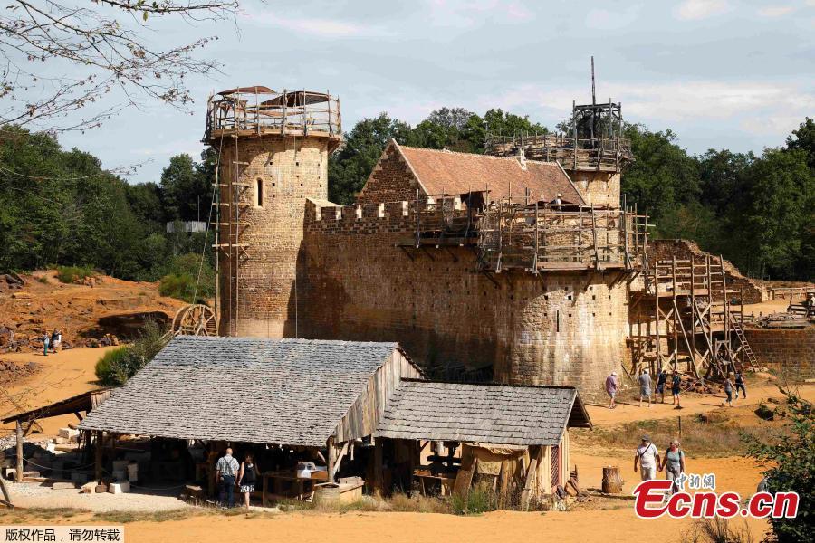 The Guédelon Castle under construction in Treigny, France, Sept. 13, 2016. Conceived by Michel Guyot, owner of Saint-Fargeau Castle, the project started in 1997 and the aim is to build an entire castle using nothing but tools, techniques, and materials that 13th century workers would use. The project has created jobs and is now a tourist destination, with more than 300,000 visits each year. (Photo/Agencies)