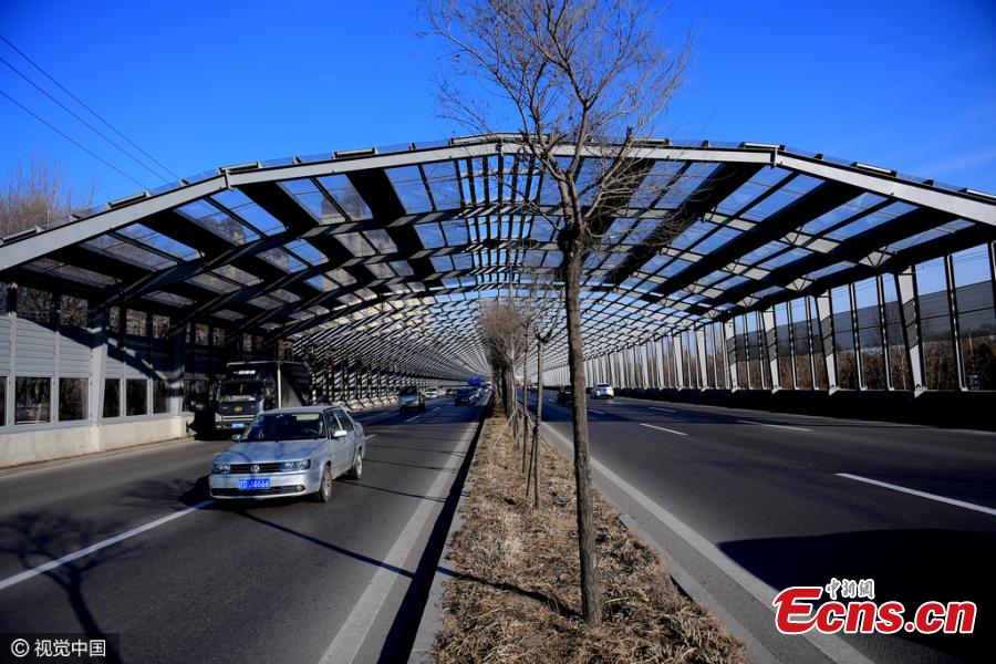 A 1,000-meter-long noise-reduction shelter is seen in Shenyang, Northeast China’s Liaoning province on December 5, 2016. The tunnel built with an investment of 60 million yuan ($8 million) utilizes enclosed acoustic barriers, which effectively reduce the noise pollution caused by heavy traffic. (Photo/CFP)