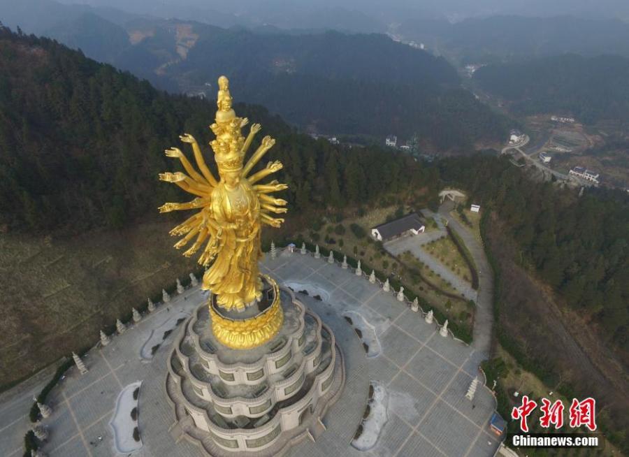 An aerial view of a thousand-hand Bodhisattva sculpture at the Miyin Temple in Ningxiang County, Central China’s Hunan Province, Dec. 29, 2016. The sculpture, at 99.19 meters tall, is said to be the largest outdoor thousand-hand Bodhisattva sculpture. (Photo: China News Service/Yang Huafeng)