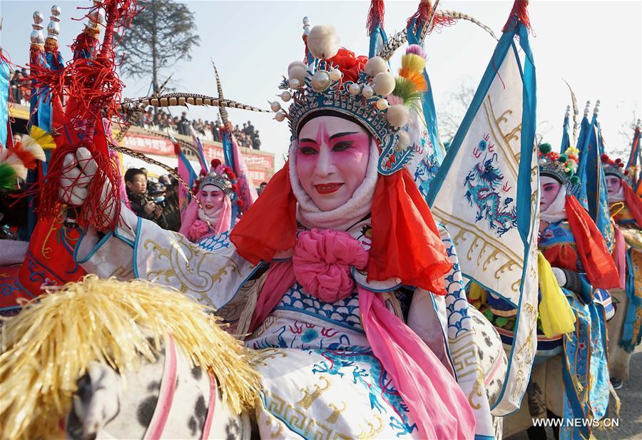 An actor performs Shehuo at a temple fair in Junxian County, central China\'s Henan Province, Feb. 12, 2017. Shehuo is a folk entertainment popular in China. It can be traced back to ancient rituals to worship the earth, which people believe could bring good harvests and fortunes in return. (Xinhua/Li An)