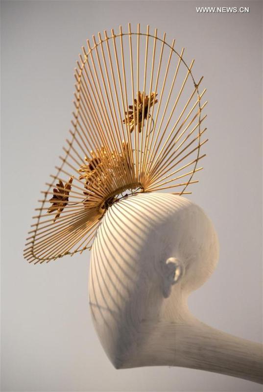 A hat is on display at the Masks of Personalities exhibition in the Art Museum in Nanjing University of Arts, April 8, 2017. The items were designed by young Chinese designer Sui Yida who hopes to show how various types of hats resonate with different people\'s personalities. (Photo/Xinhua)