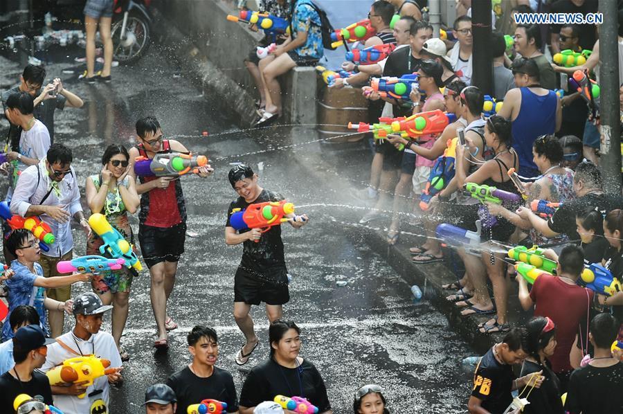 People participate in a water fight during the Songkran Festival celebration in Bangkok, Thailand, April 13, 2017. Songkran Festival, also known as water festival, is celebrated in Thailand as the traditional New Year\'s Day, which normally falls on April 13 to 15. (Xinhua/Rachen Sageamsak)