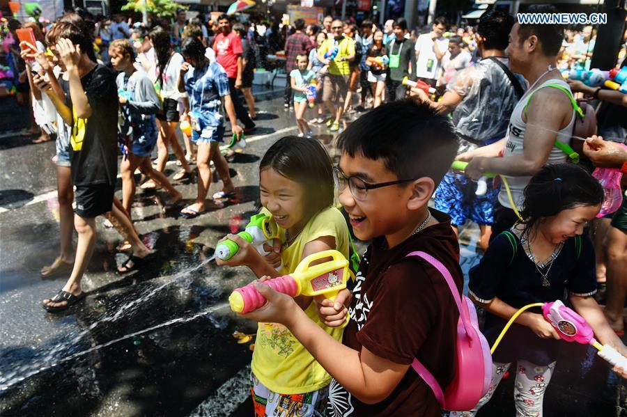 People participate in a water fight during the Songkran Festival celebration in Bangkok, Thailand, April 13, 2017. Songkran Festival, also known as water festival, is celebrated in Thailand as the traditional New Year\'s Day, which normally falls on April 13 to 15. (Xinhua/Rachen Sageamsak)