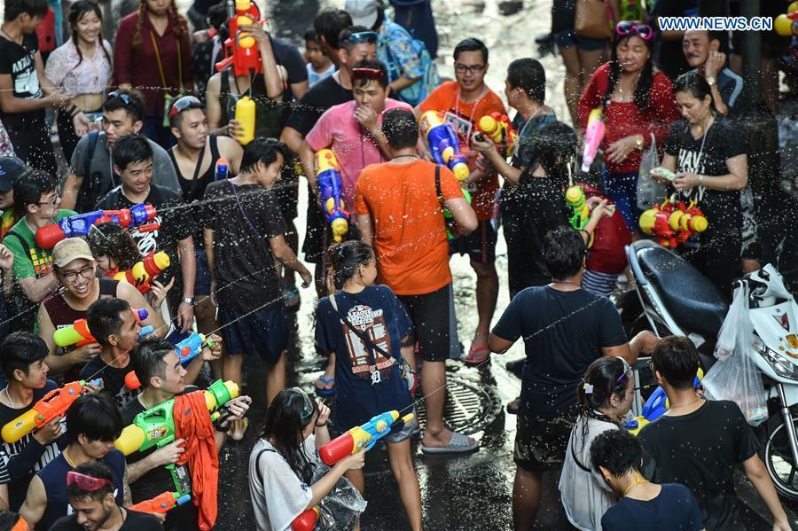 People participate in a water fight during the Songkran Festival celebration in Bangkok, Thailand, April 13, 2017. Songkran Festival, also known as water festival, is celebrated in Thailand as the traditional New Year\'s Day, which normally falls on April 13 to 15. (Xinhua/Rachen Sageamsak)