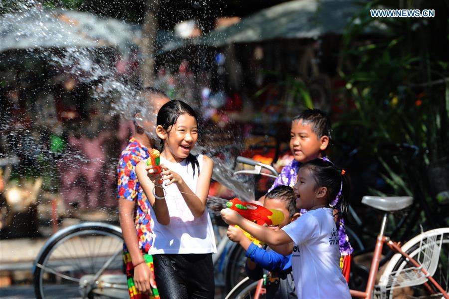 People participate in a water fight during the Songkran Festival celebration in Bangkok, Thailand, April 13, 2017. Songkran Festival, also known as water festival, is celebrated in Thailand as the traditional New Year\'s Day, which normally falls on April 13 to 15. (Xinhua/Rachen Sageamsak)