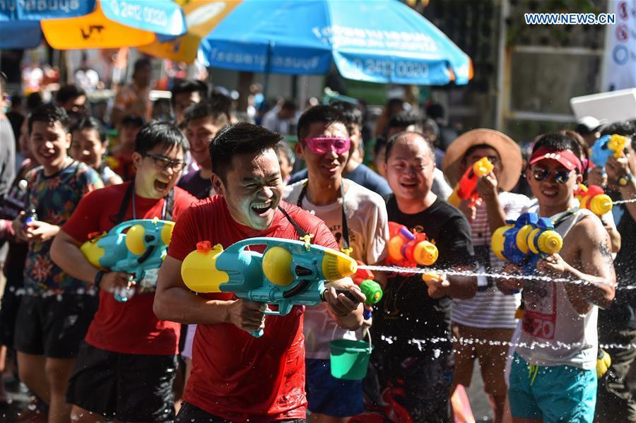 People participate in a water fight during the Songkran Festival celebration in Bangkok, Thailand, April 13, 2017. Songkran Festival, also known as water festival, is celebrated in Thailand as the traditional New Year\'s Day, which normally falls on April 13 to 15. (Xinhua/Rachen Sageamsak)