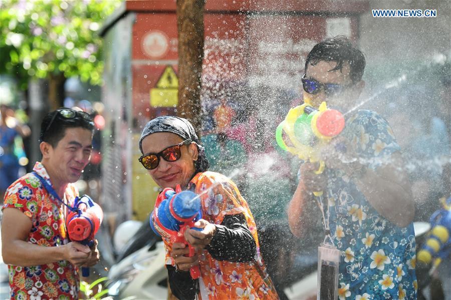 People participate in a water fight during the Songkran Festival celebration in Bangkok, Thailand, April 13, 2017. Songkran Festival, also known as water festival, is celebrated in Thailand as the traditional New Year\'s Day, which normally falls on April 13 to 15. (Xinhua/Rachen Sageamsak)